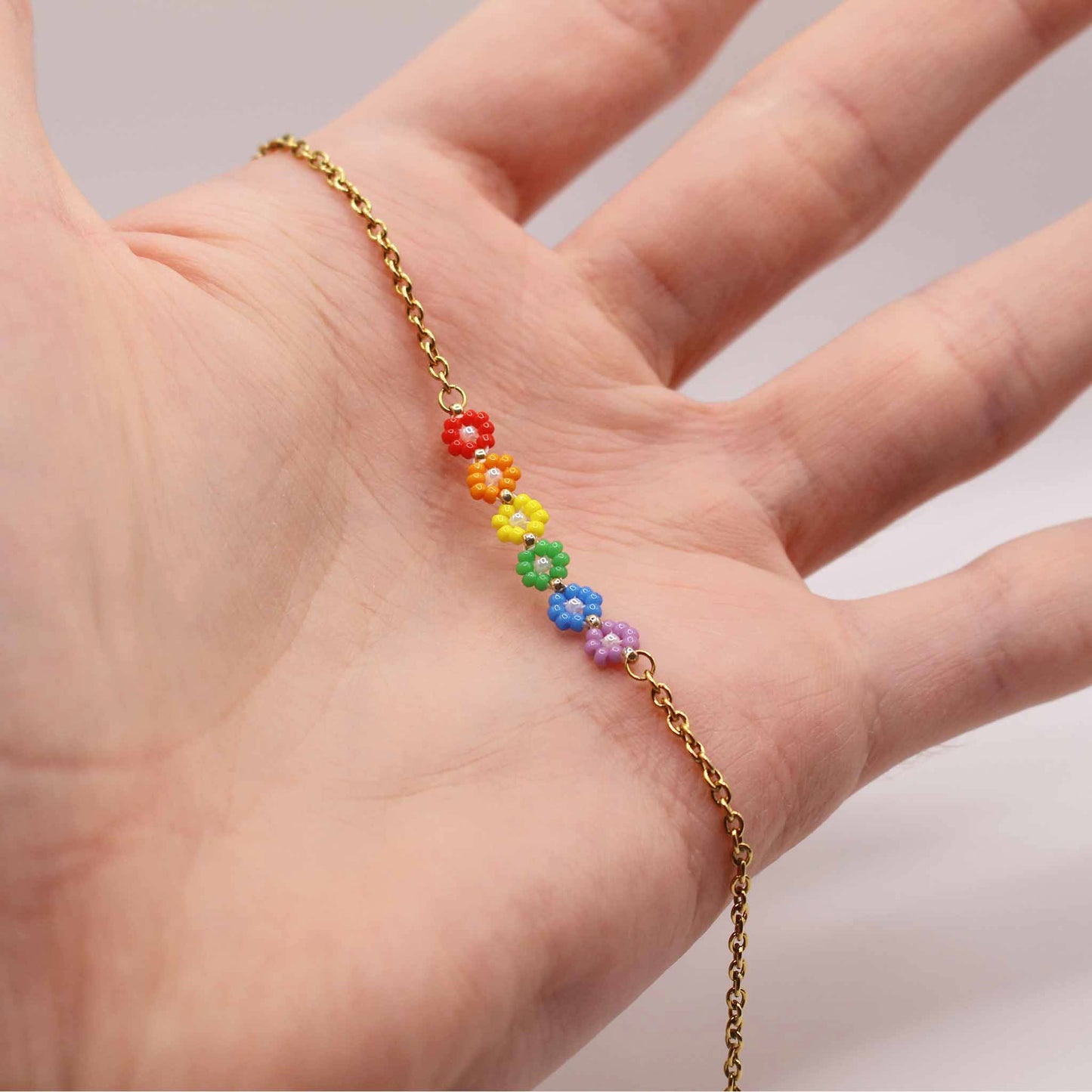 Collana oro con margherite arcobaleno