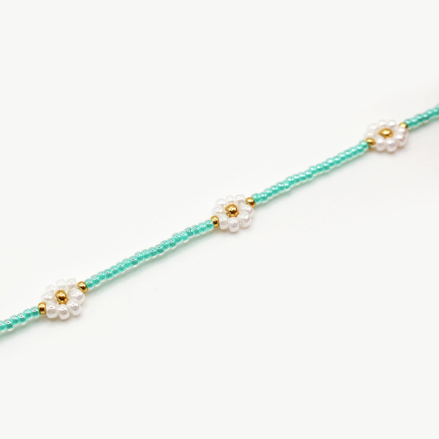 Collana margherite turchese